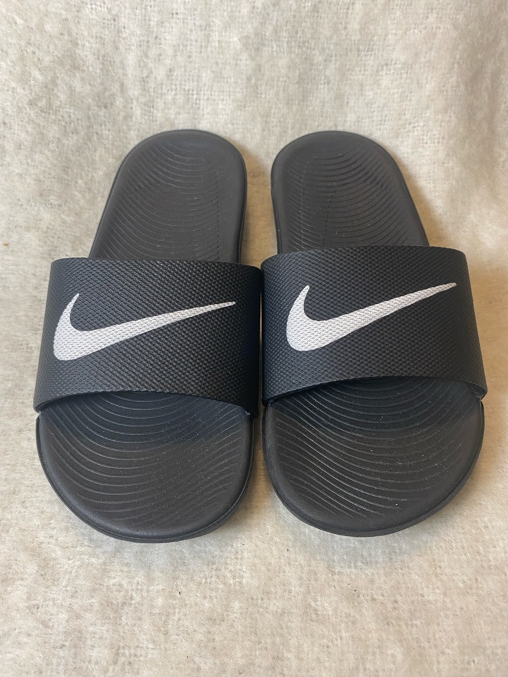 Nike Black Slides with White Swoosh Logo